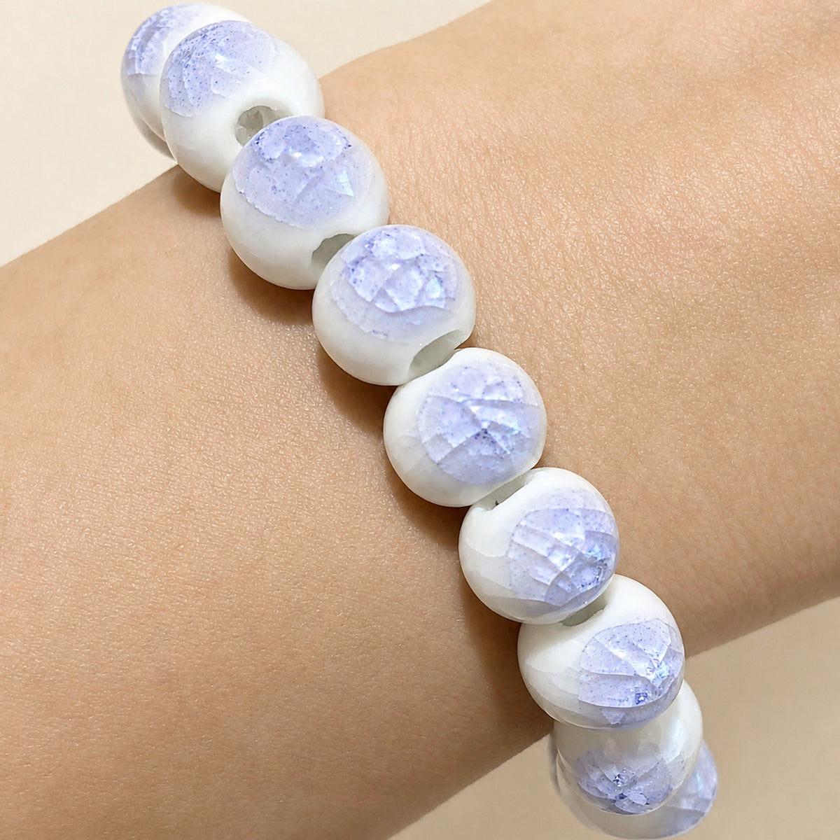 LUMI purple ice-crackle glaze ceramic bracelet 10mm — close-up of glaze texture and hand-finished beads