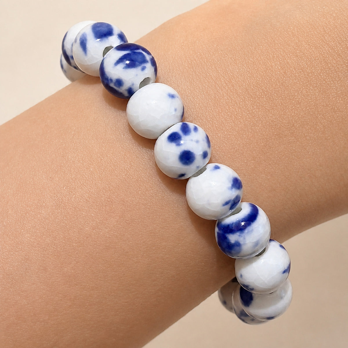 LUMI Qing Hua blue-and-white porcelain bracelet 10mm — close-up of glaze texture and hand-finished beads