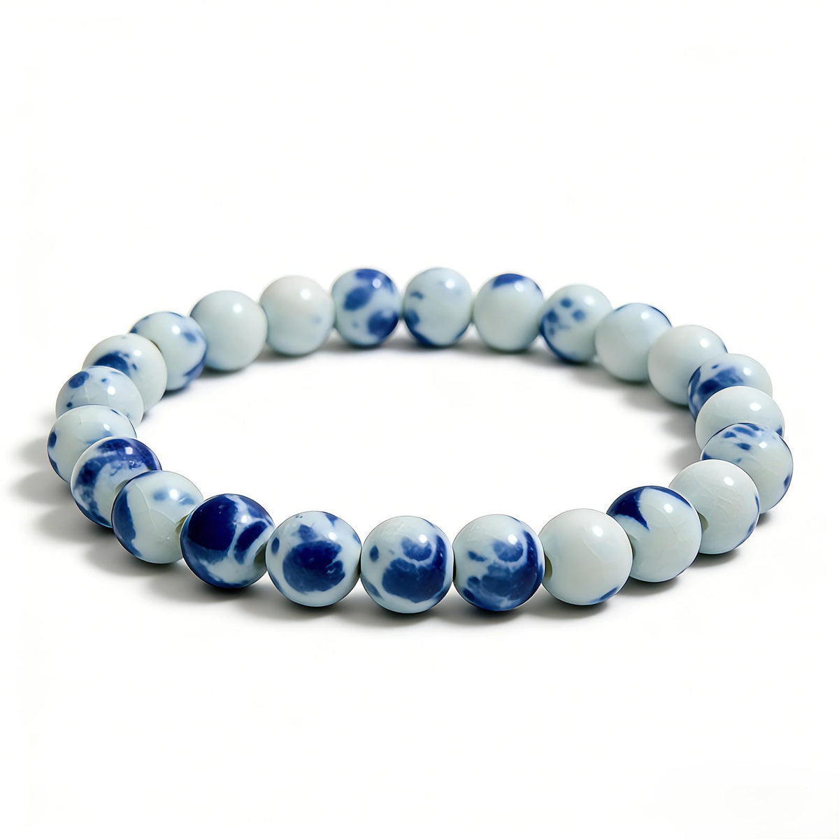 LUMI handmade Jingdezhen blue-and-white (qing hua) porcelain ceramic bead bracelet, 8mm, side view